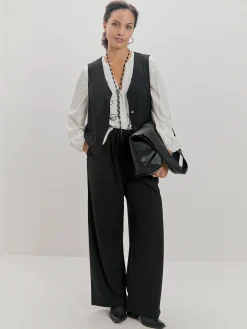 Encuentro Moda CHALECO BASICO BOTONES